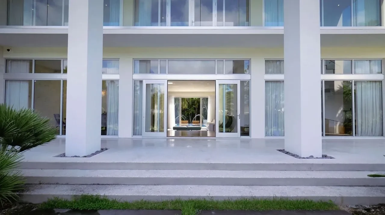 Modern residential building facade with central entrance