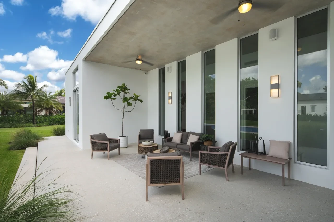 Maxwell Woods Residence — covered outdoor patio with seating